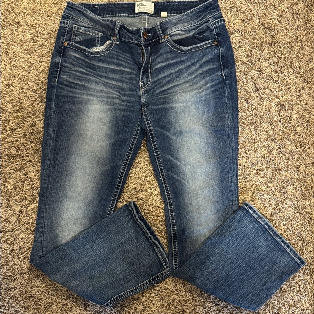 BKE Women's Stella Bootcut Jeans in Dark Blue with lighter wash.